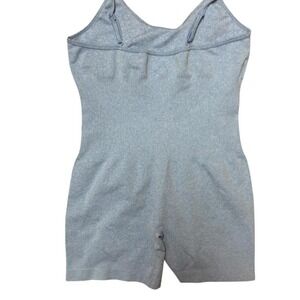 Oqq body con‎ onesie